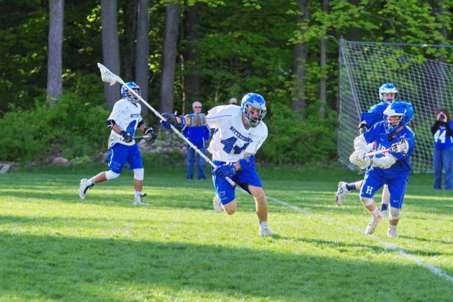 Kittatinny's Parker Lobban (44) carries the ball. Lobban picked up seven ground balls. Photos by George leroy Hunter