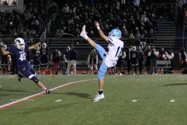 A Randolph Ram unsuccessfully blocks the punt.