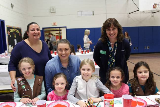 Girl scouts create 'Hearts of Hope' Standing, from left, Troop Leaders Ann Marie Kraemer and Mandie Hudson, and Betty Garger, CEO of Girl Scouts of Northern NJ. In front, from left, Cat, Lauren, Kathryn, Catherine and Jordyn