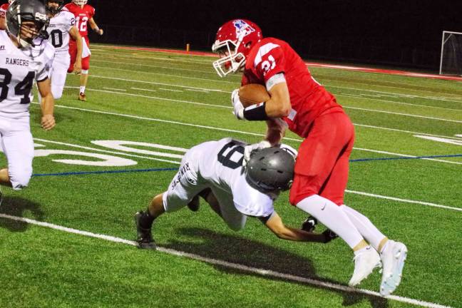 LVRHS beats Wallkill, 19-7 Lenape Valley ball carrier Brandon Brady collides with Wallkill Valley defensive back Evan Faner in the first half. Brady accomplished 10 carries for 92 yards and a five-yard touchdown run.