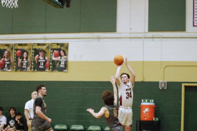 Newton's Kevin Kozlowski aims the ball during a shot in the second half.