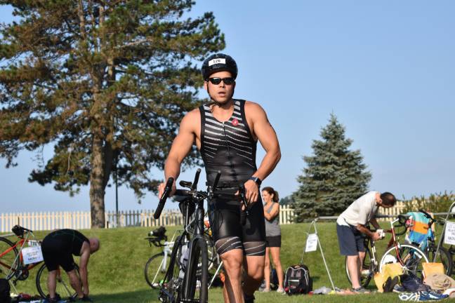 The triathlon's transition area was in a grassy field, where athletes donned helmuts and shoes before heading out onto the bike course through Sparta, Byram, and Andover.