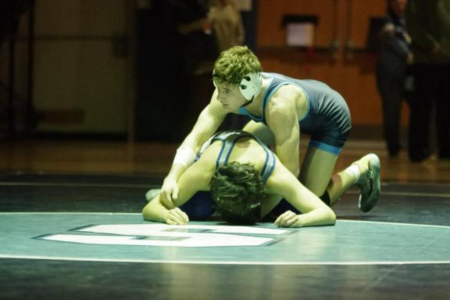 Sparta's Logan Hrenenko handles Kittatinny's Leonardo Garcia in the 138-pound weight class. Hrenenko won by technical fall (20-4) in 4:15 on Jan. 26.