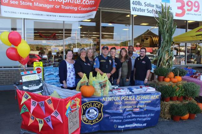 ShopRite of Newton “Packs the Pantry” From left, Robin Harvey, Joy Wagner, General Store Manager Debbie Lynch, Sergeant Frank Philhower, Cindy Golec, Assistant Store Manager Suzanne Des Rochers, Walter Manley and Sean Szanyi