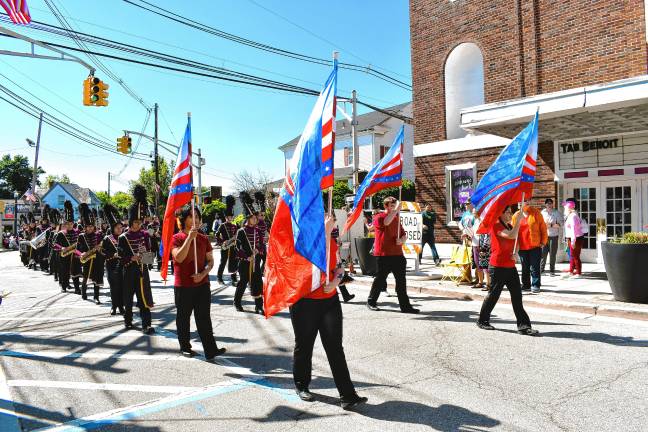 Photos: Memorial Day Parade in Newton The Newton High School marching band and color guard march in the parade.