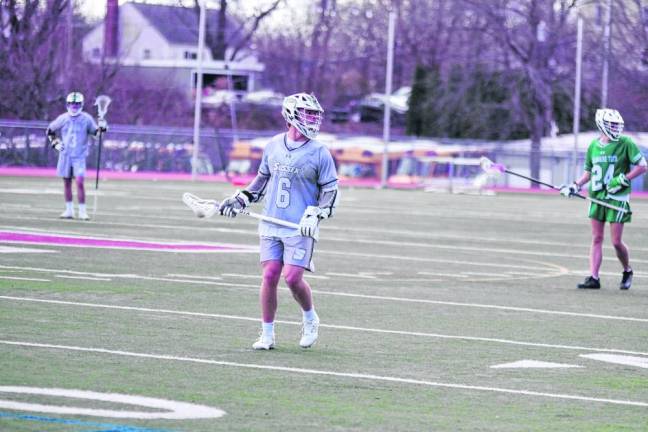 Sussex County's Jeremiah Carfello with the ball.