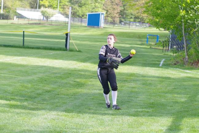 Wallkill Valley outfielder Brianna Millier fields and throws.