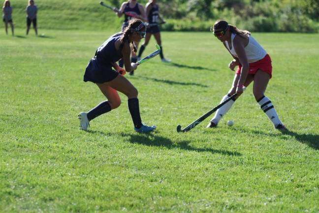 High Point tops LVRHS in field hockey opener Lenape Valley's Olivia Hickey and High Point's Julianne Mangano face each other as they try to gain control of the ball.