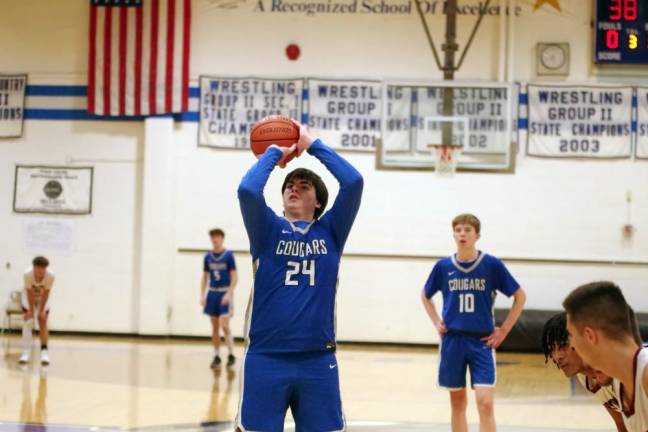 Kittatinny's Connor Logan is about to shoot from the free throw line. He scored 13 points in the game.