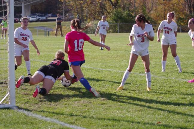 Emerson goalie Gillian Pasqualino intercepts the ball, preventing a Kittatinny score. She made 22 saves in the game.