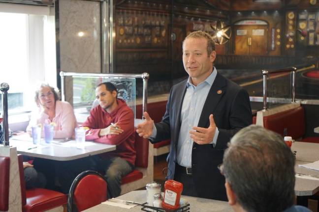 Below: Gottheimer speaks at the Route 206 diner during a “Cup of Joe with Josh” Town Hall.