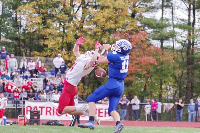 Lenape Valley defender Drew Togno breaks up a pass intended for Kittatinny wide receiver Luke Williams and the ball drops between them in the second half.