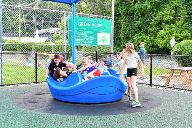 Inclusive playground opens The new playground was funded by the state Green Acres program. (Photo by Maria Kovic)