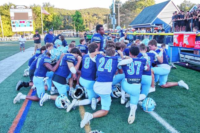 Football roundup: High Point remains undefeated <b>The Spartans huddle up before the start of the game.</b>