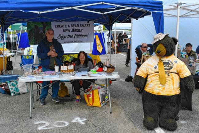 Photos: Lake Hopatcong Block Party LH2 Linda Schroeder of Sparta and Donna Yturbe of West Milford seek signatures on a petition opposing the state bear hunt.