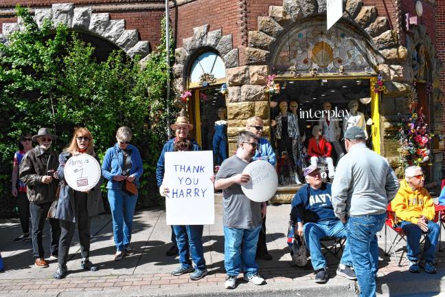 Photos: Memorial Day Parade in Newton Residents hold up signs thanking Harry Kaplan, grand marshal of the parade.