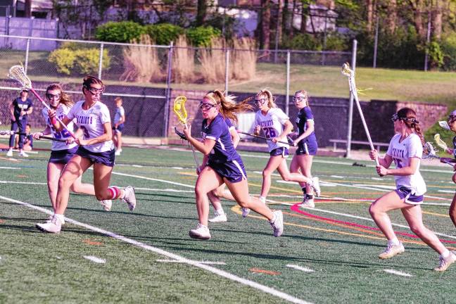 Patriots win 2 silvers in H/W/S Championships LV2 Pope John's Olivia Zywicki is on the move with the ball. She scored one goal.