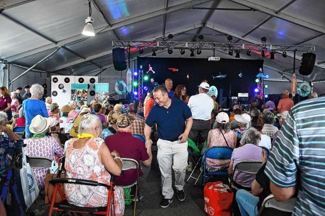 Hill named Senior of the Year <b>Rep. Josh Gottheimer, D-5, greets people at the Senior Day event Thursday, Aug. 7 at the fairgrounds. (Photo provided)</b>