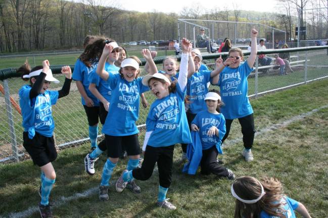 Play ball! Lenape Blazers softball players danced to the tunes of DJ Casey before Hobb Engler Little League and Lenape Blazers Softball League's opening ceremony.