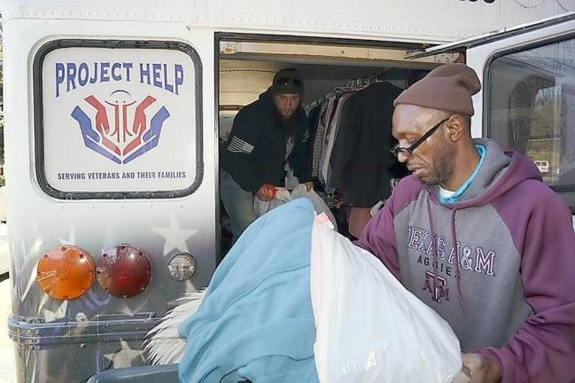 Project Help loads the Santa Bus