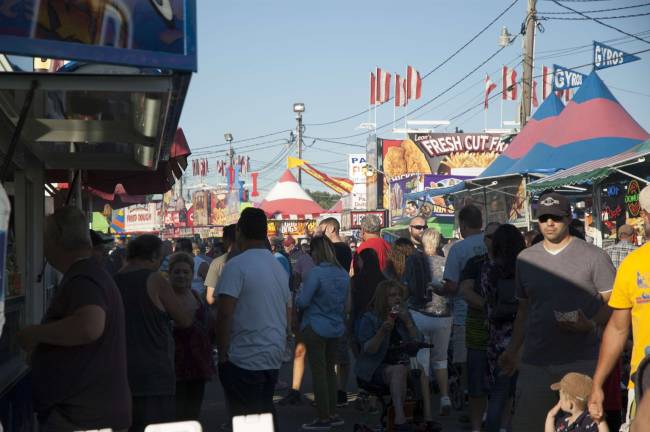 Miss Green is Queen of the Fair The bustling fairway