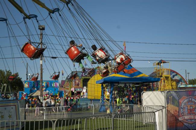 Miss Green is Queen of the Fair The swings