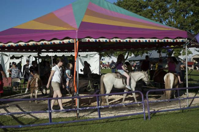 Miss Green is Queen of the Fair The merry-go-round