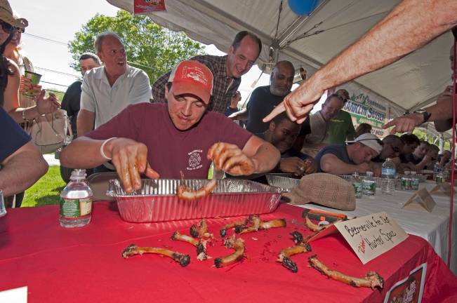 Teenager downs rack of ribs in 2 minutes Photos by Warren Westura Winner Hunter Space of Beemerville FD leaves a trail of gnawed bones