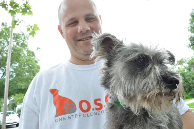 Chili with a chance of adoption Photos by Robert Oszust Volunteer Andy Choffo and his foster dog Sabastian.