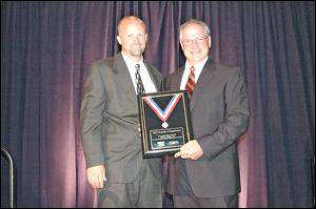 Local builder receives dual awards from Association Local builder receives dual awards from Association