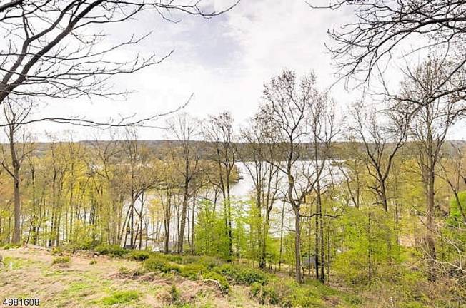 Stunning home offers panoramic views of Lake Mohawk Stunning home offers panoramic views of Lake Mohawk