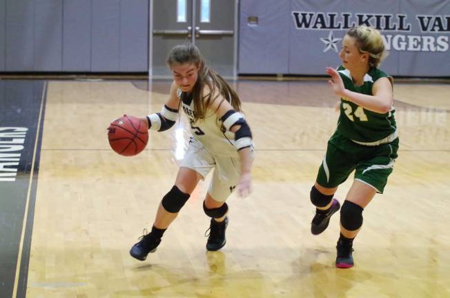 Veritas girls beat Wallkill in hoops Wallkill Valley's Patricia Stecher dribbles the ball while covered by Veritas Christian's Karlea Zazopoulos. Stecher scored eleven points.