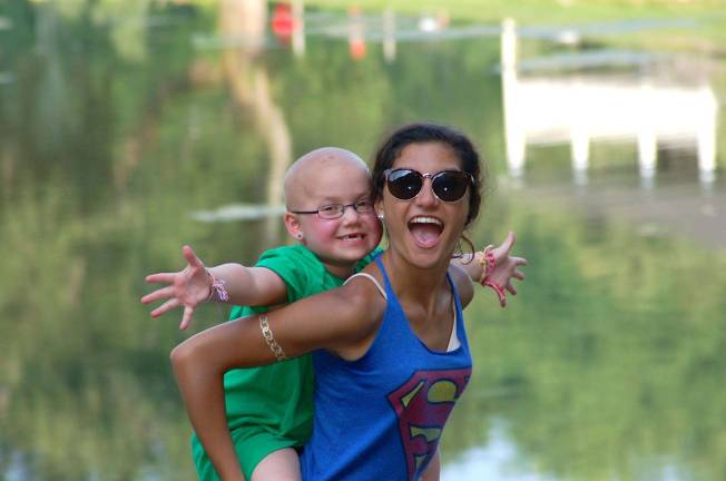 Camp brings happiness to kids with cancer Camp brings happiness to kids with cancer
