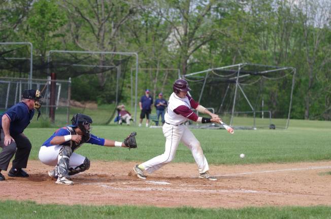 Newton loses to Lodi in baseball Newton's Joe Maker connects with the ball.