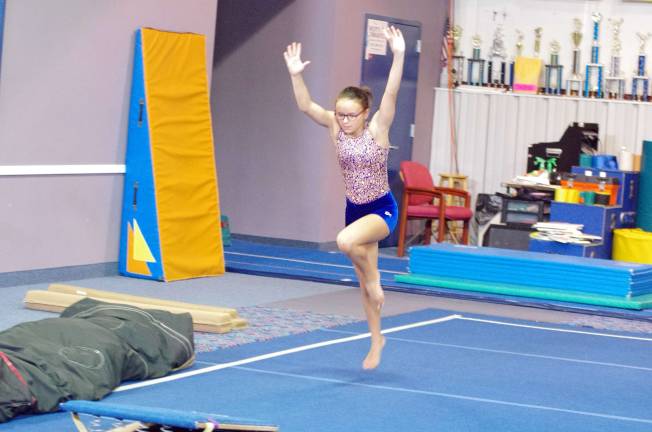 Skills clinic readies gymnasts Eleven year old Westys gymnast Adrianna Barone in the midst of a floor routine. Barone is a resident of Stockholm, New Jersey.