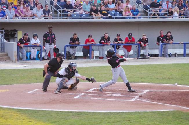 Miners win one of three from Jackals Jackals Rylan Sandoval connects in the first inning.