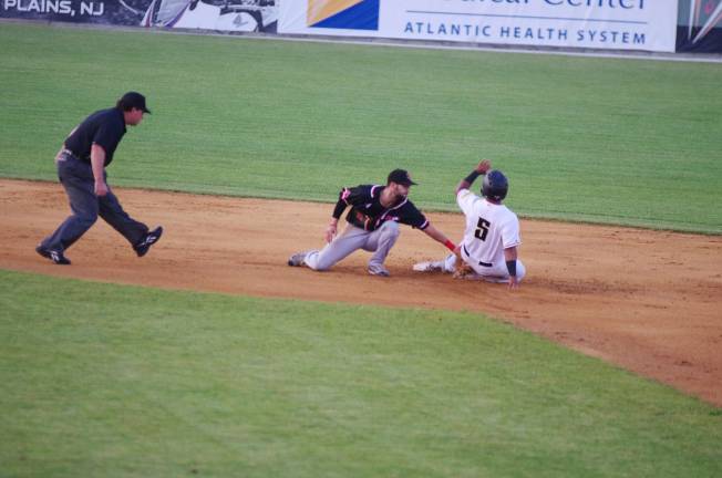 Miners win one of three from Jackals Jackals infielder Rylan Sandoval's tag is too late as Miner Alexi Colon slides safely into second base in the first inning.