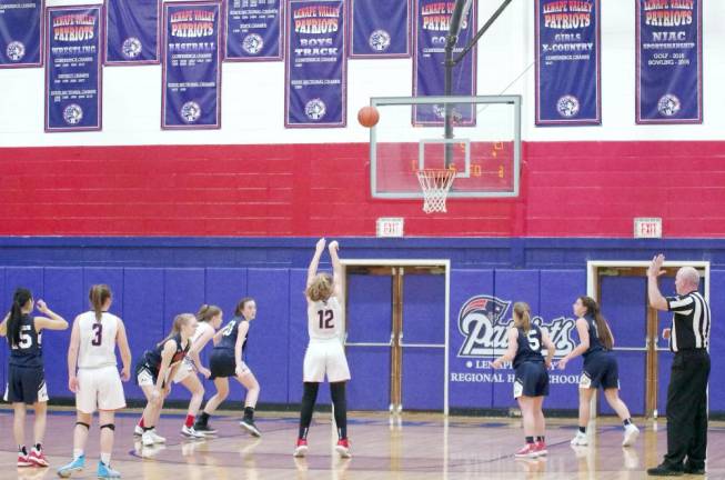 Lenape Valley vs North Warren Lenape Valley's Brienna Pangborn handles the ball during a foul shot in the first half. Pangborn scored 19 points, grabbed 10 rebounds and is credited with 1 steal.