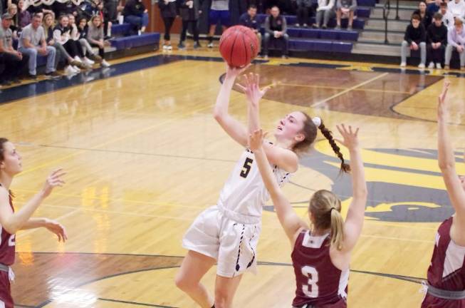 Jefferson's Patricia Orlandoni leaps high with the ball during a shot in the first half. Orlandoni scored 13 points.