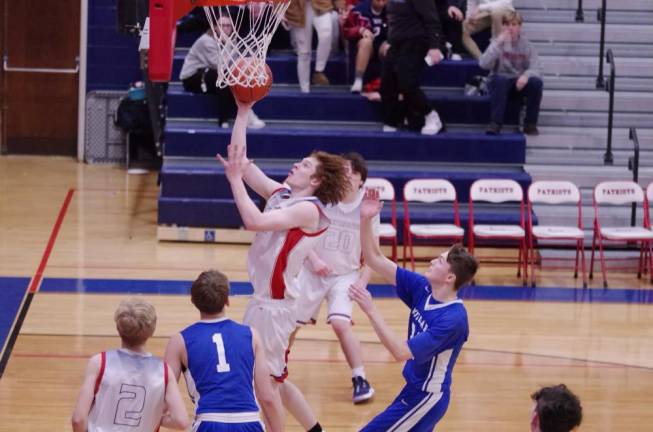 Kittatinny defeats Lenape Valley in boys' varsity basketball Lenape Valley's Troy Brennan soars toward the hoop during a shot in the fourth quarter.