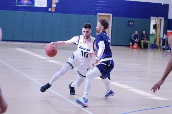 Sussex County's Reldi Durrsi dribbles the ball while covered by Camden County's Rahsaan Brown in the first quarter.