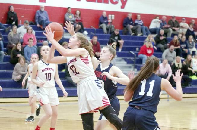 Lenape Valley vs North Warren Lenape Valley's Brienna Pangborn handles the ball during a shot in the first quarter. Pangborn scored 19 points, grabbed 10 rebounds and is credited with 1 steal.