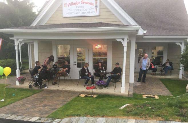 Shoppes at Lafayette give 'village' new life New businesses, returnees and those that have stayed A Memorial Day celebration in front of Village Sweets
