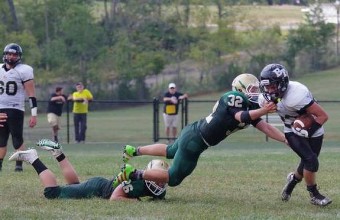 Sussex Tech romps over Bergen PHOTOS BY GEORGE LEROY HUNTER Sussex Tech linebacker Kevin Utter grabs the jersey of Bergen Tech running back Tyler Pavese.