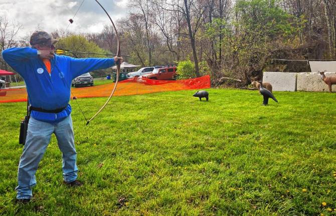 BOW1 John Goralski of Milford, Pa., takes part in the 30th annual Traditional Bow Shoot sponsored by the Appalachian Bowmen of Sussex County. The three-day event was held at the Whittingham Wildlife Management Area in Newton. Camping was available for the first time in four years. (Photo by Maria Kovic)