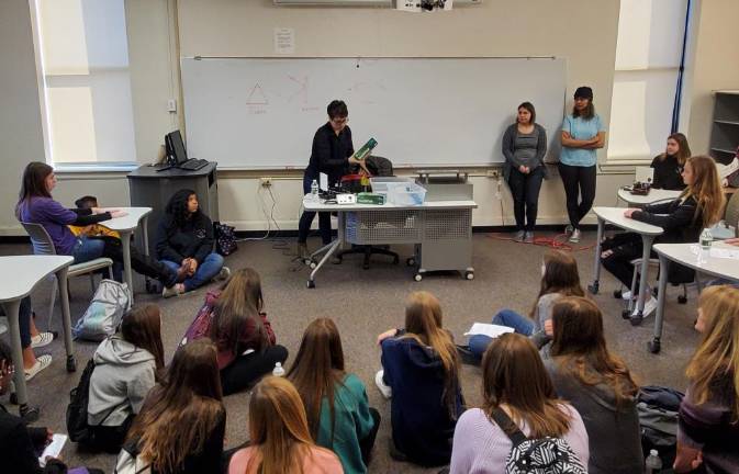 Thorlabs engineer Audrey Wall leads students in a hands-on fiber optic workshop during a Women in STEM event held on Thursday, Jan 9, 2020 at Sussex County Community College.