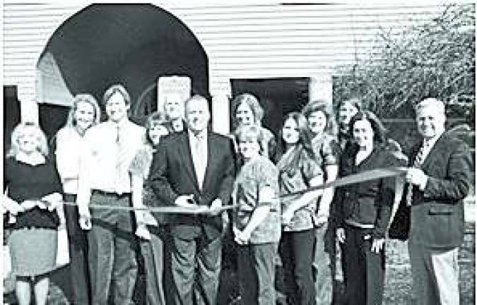 Area dental practice moves to Andover Photo Provided Andover Mayor Michael Lensak, Dr. Michael T. Ward, along with his family and staff, cut the ribbon at their new location, 61 Newton-Sparta Rd. in Andover.
