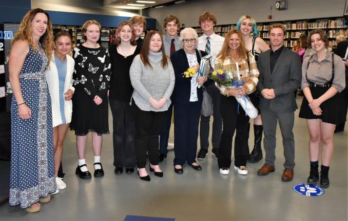 Students pose with speakers at the opening of the Holocaust and Genocide Research Center.