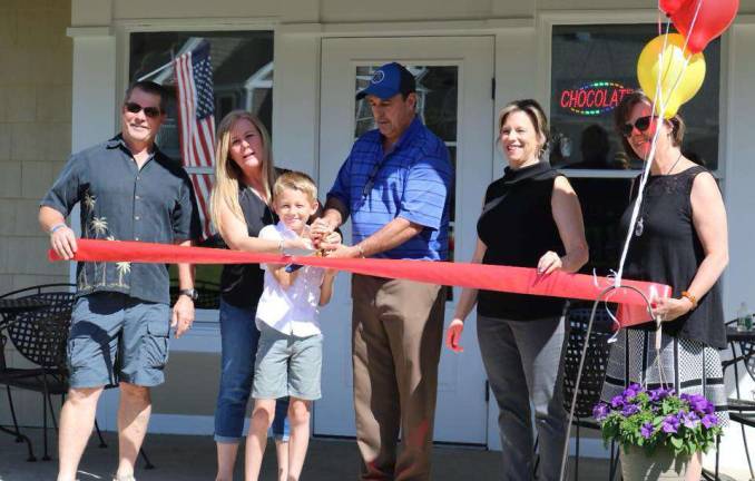 Shoppes at Lafayette give 'village' new life New businesses, returnees and those that have stayed Lafayette Mayor Hughescuts the ribbon for the official Grand Opening of Village Sweets at The Shoppes at Lafayette on June 16