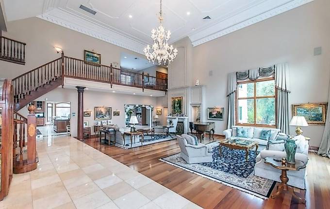 Custom estate includes car charging station, hot yoga room, and frescos Custom estate includes car charging station, hot yoga room, and frescos